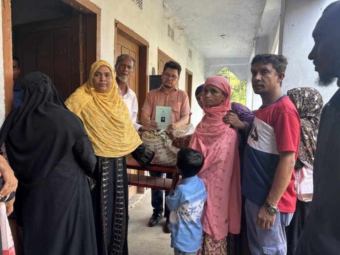 কমলগঞ্জে হতদরিদ্র নারীদের মাঝে ভিডব্লিউবি চাল বিতরণ।